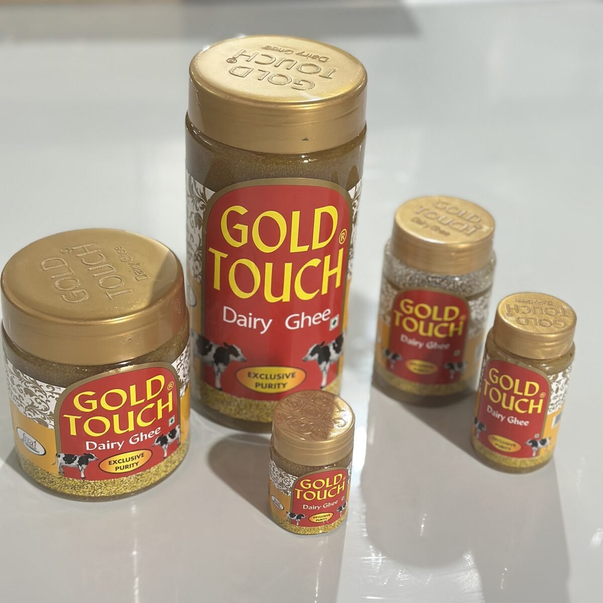 Gold Touch ghee jar on a West Bengal kitchen counter